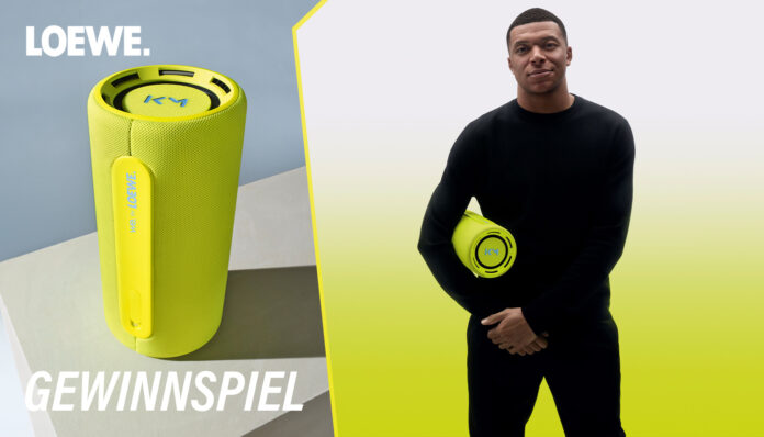 Wir verlosen einen Loewe We. Hear x Kylian Mbappé Bluetooth-Lautsprecher in Neon